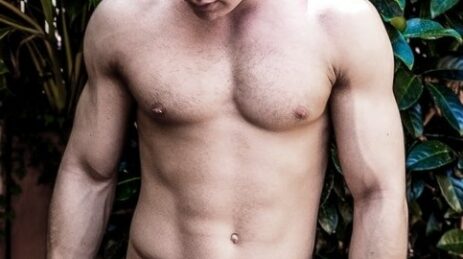Cute nude muscle boy outdoors