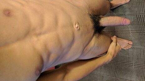 Muscular boy with erection
